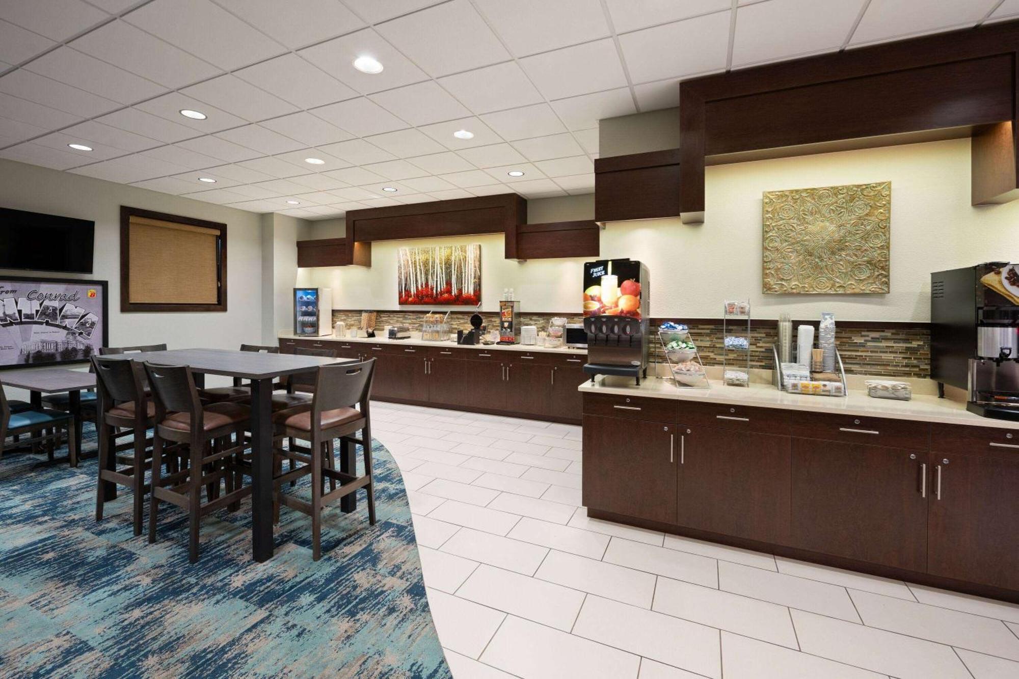 Hotel Super 8 By Wyndham Conrad Esterno foto