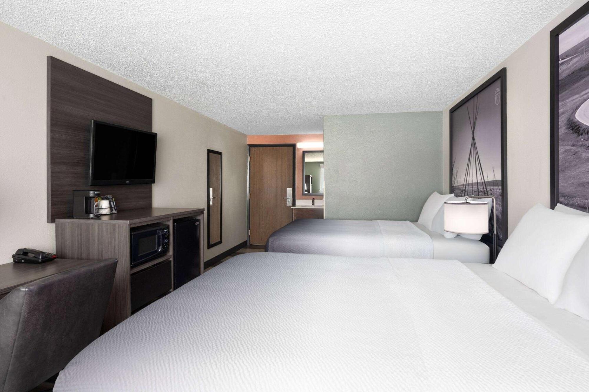 Hotel Super 8 By Wyndham Conrad Esterno foto